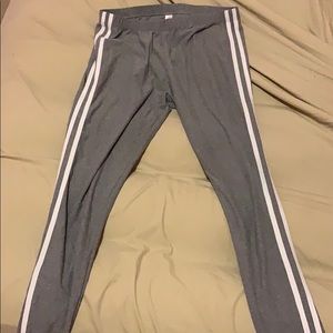 Grey leggings with two white stripes on the side